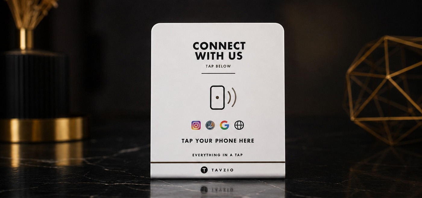 A Tavzio NFC card and stand on a restaurant table